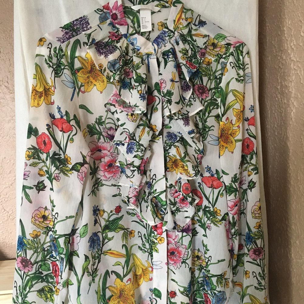 Delicate button-up floral ruffle blouse